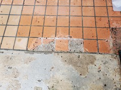 Before and after pictures of a front entrance to a daycare that we cleaned, resurfaced with (2) coats of polymer cement. For the final look we painted using a solid stain.