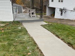 The sidewalk repairs were made and the sidewalk was resurfaced.  A dramatic improvement for the customer!