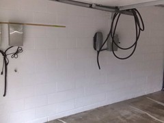 Before and after photos of a garage with water issues. Here we cleaned the walls using a high pressure power washer to properly clean. Then added a coat of primer. Finally we applied (2) coats of Liquid Rubber Sealant.