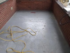 The porch had cracks and pieces missing from the steps. Our team repaired all cracks and rebuilt steps where needed using polymer cement. The finish look is a resurfacer on the entire porch and steps.