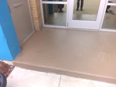 Before and after pictures of a front entrance to a daycare that we cleaned, resurfaced with (2) coats of polymer cement. For the final look we painted using a solid stain.